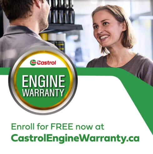 The Mufflerman, Mechanic Near Me A woman beams at a man in a store lined with shelves of motor oil. Overlay text: Enroll for FREE now and enjoy the peace of mind with Castrol Engine Warranty at CastrolEngineWarranty.ca.