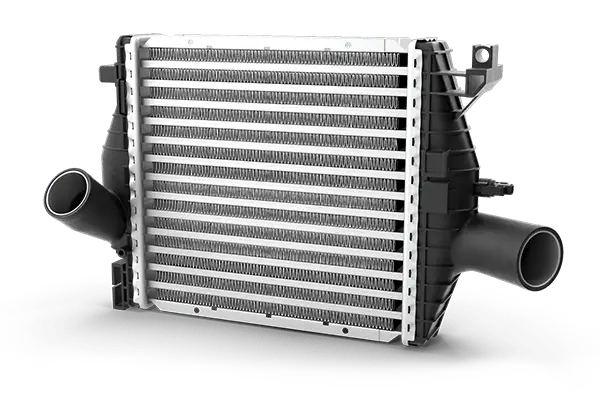 The Mufflerman, Mechanic Near Me A car intercooler with black plastic end tanks on both sides and metal cooling fins in the center, featuring two large inlet and outlet pipes on either side against a black background, is essential for optimal performance during vehicle service.